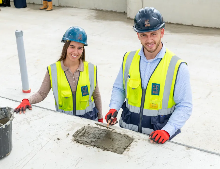 Man and woman at topping out ceremony 